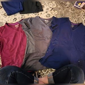 3 XL scrub shirts